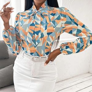 Geometric blouse with tie neck